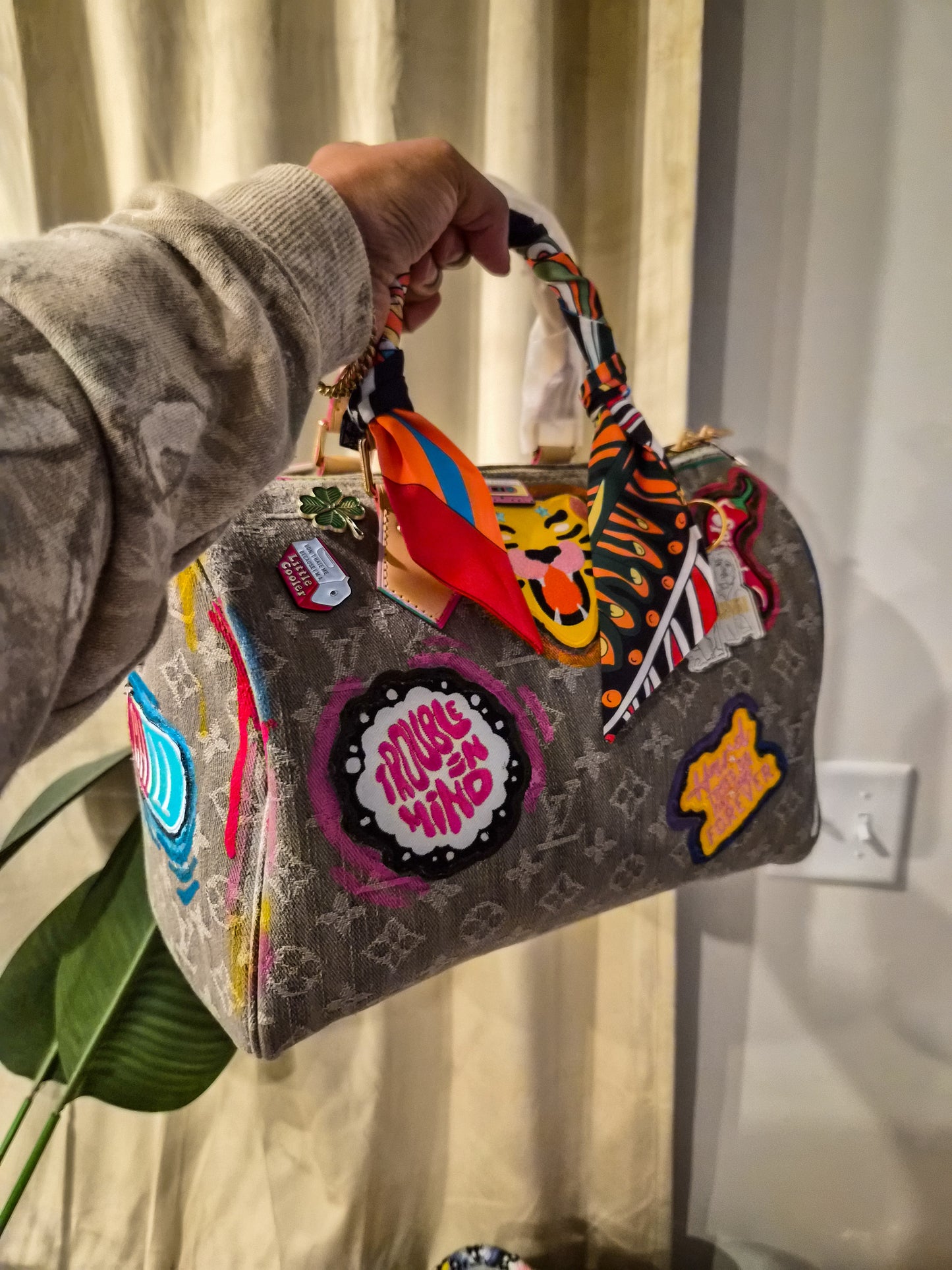Distressed Artwork on Light Denim Speedy