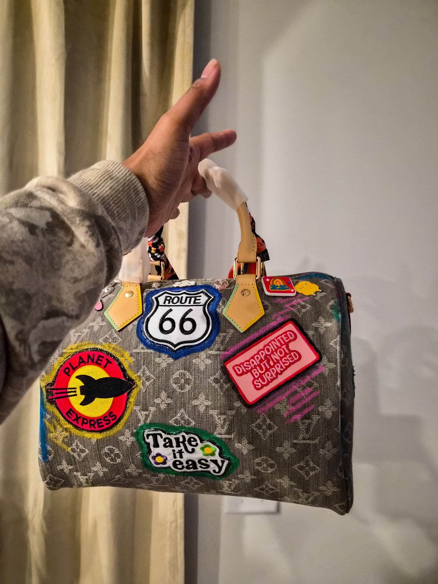 Distressed Artwork on Light Denim Speedy